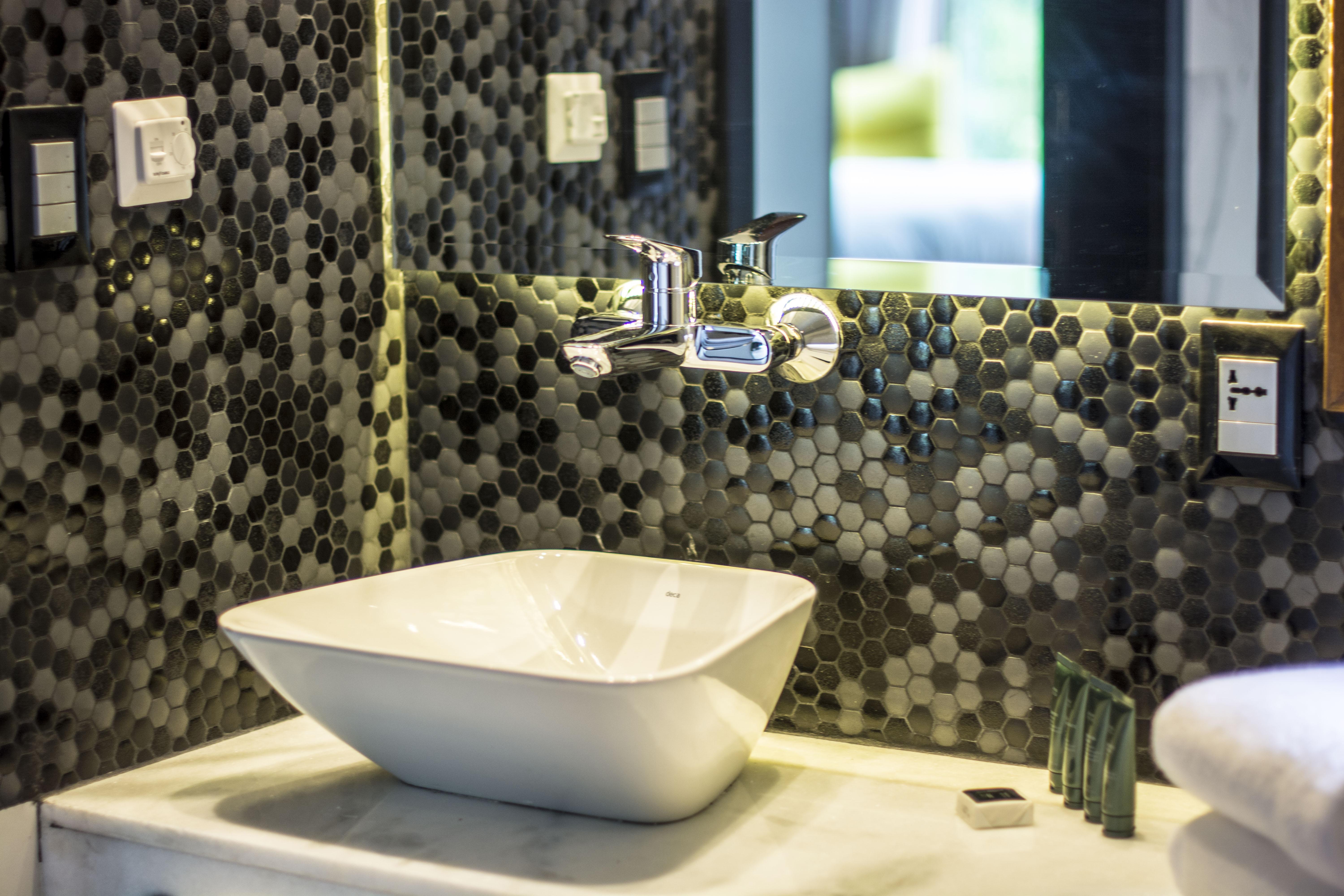 Five Hotel & Residences Assunção Exterior foto A modern vessel sink